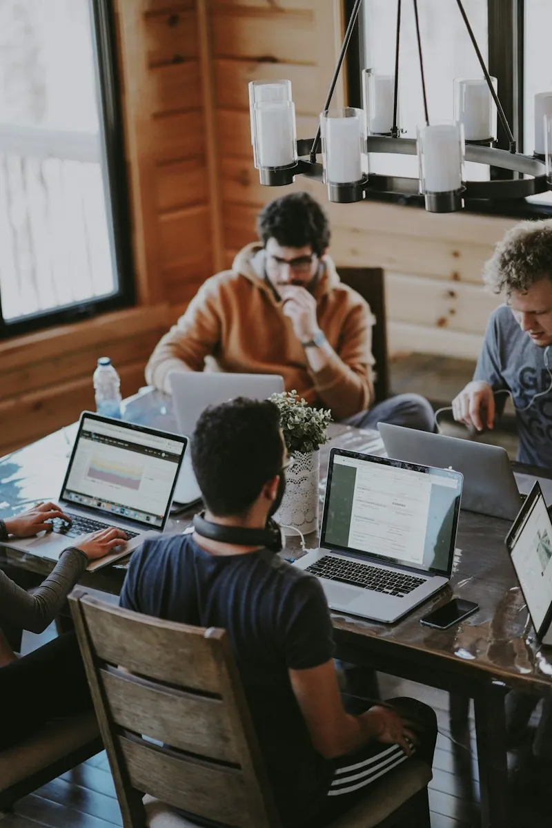 Professionals discussing an idea together around a table